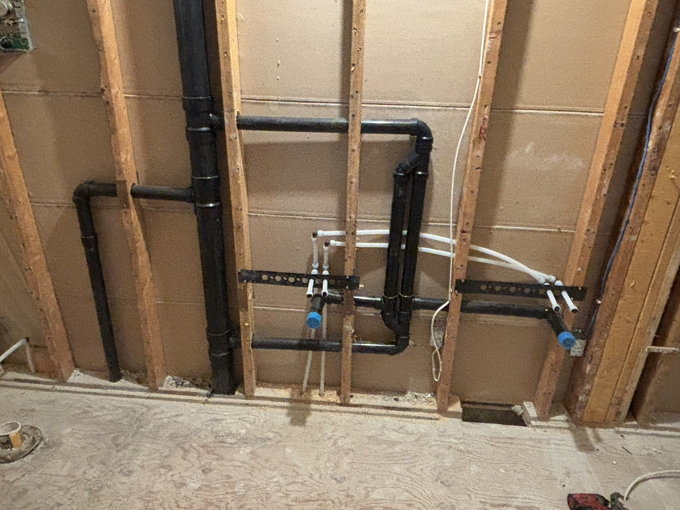 Bathroom renovation rough-in with new drains and PEX supply by ARD Plumbing